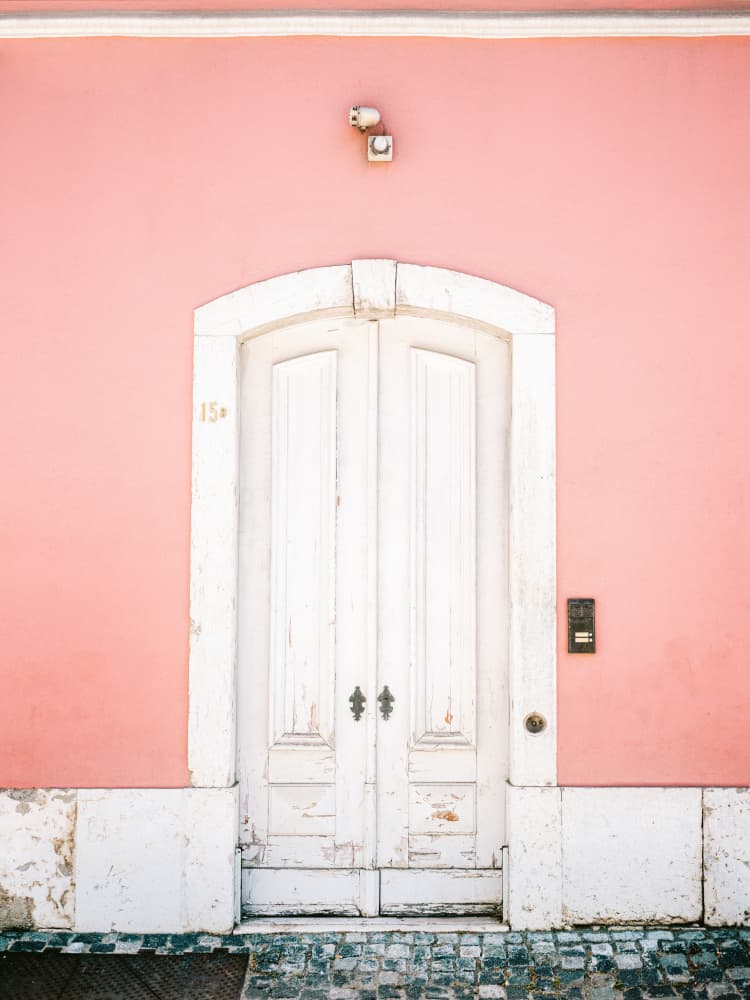 The white door Lisbon by Raisa Zwart — canvas wall art