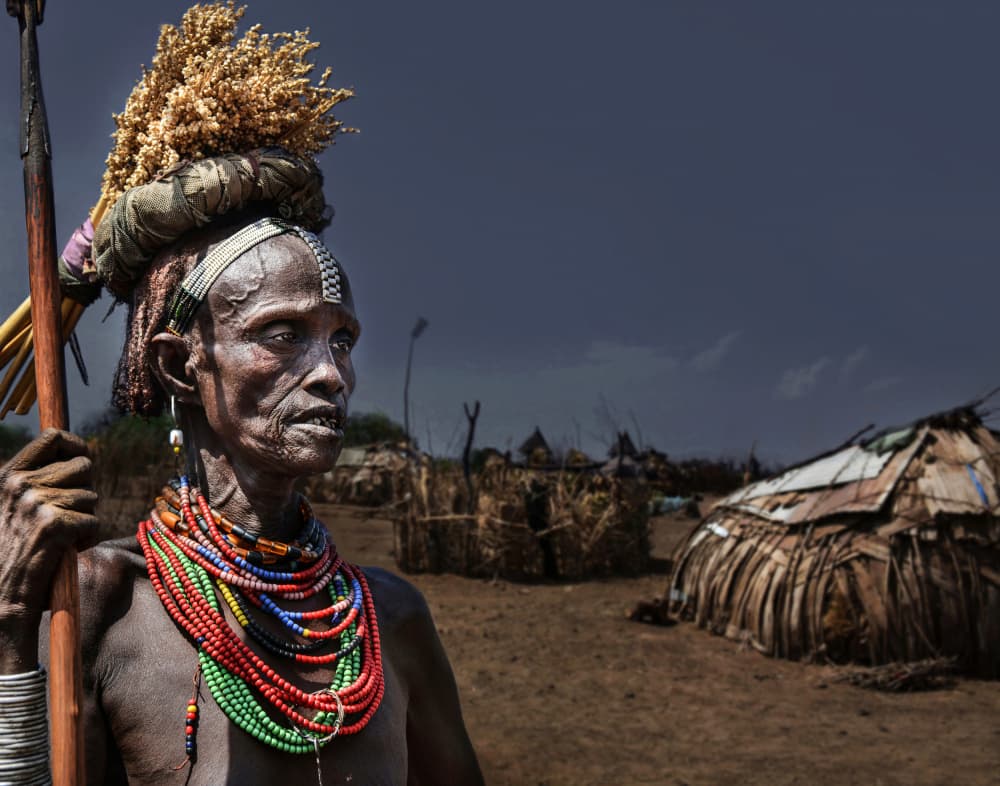 Stoic Tribal Elder by Irene Perovich — canvas wall art