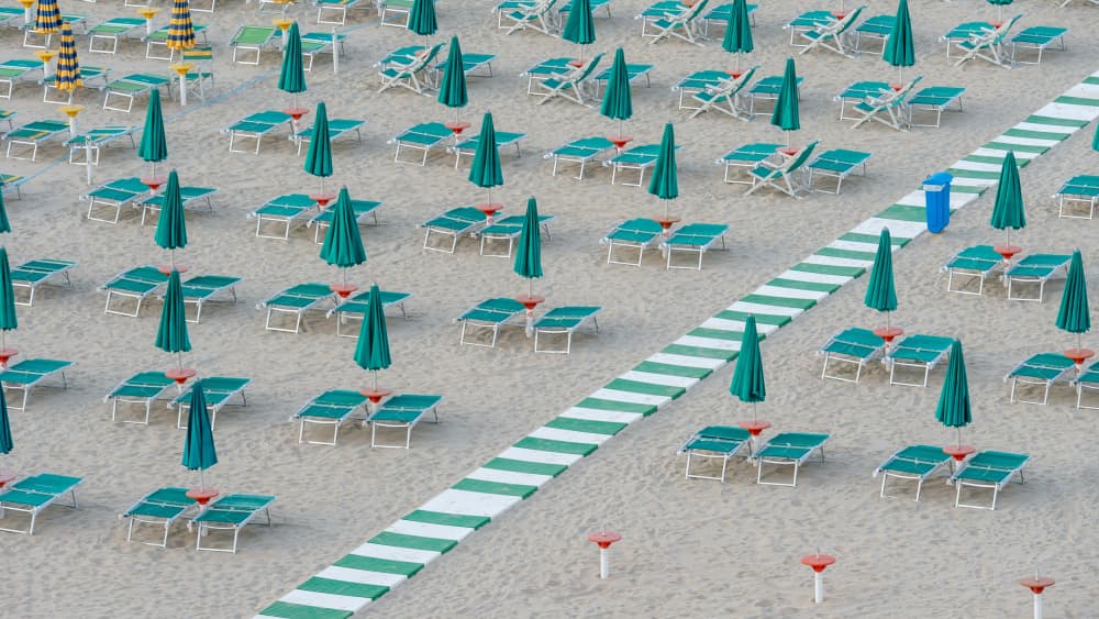 Orderly Beach Umbrellas by Markus Auerbach — canvas wall art