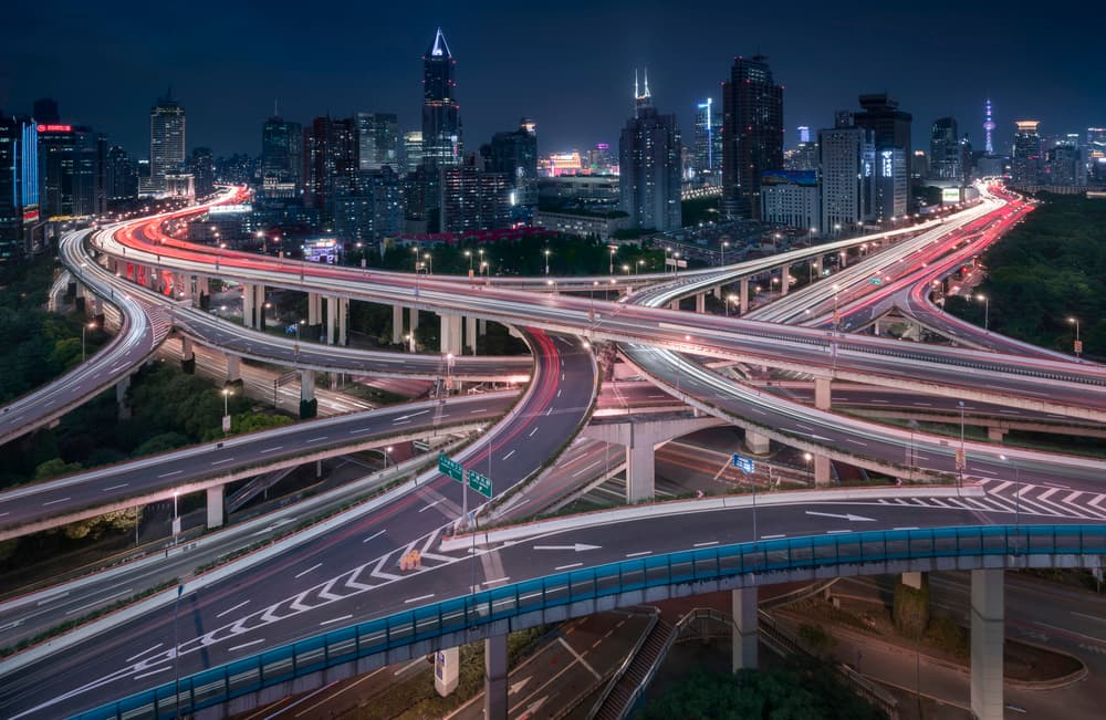 Modern City Light Trails by Richard Vandewalle — canvas wall art