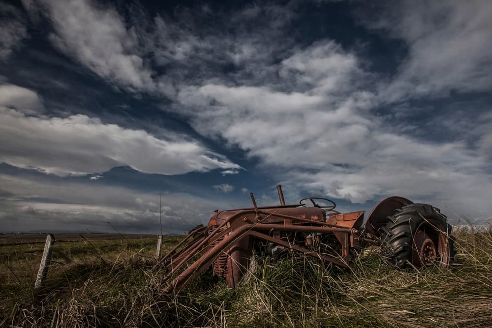 Abandoned Farm Tractor by Bragi Ingibergsson - BRIN — canvas wall art