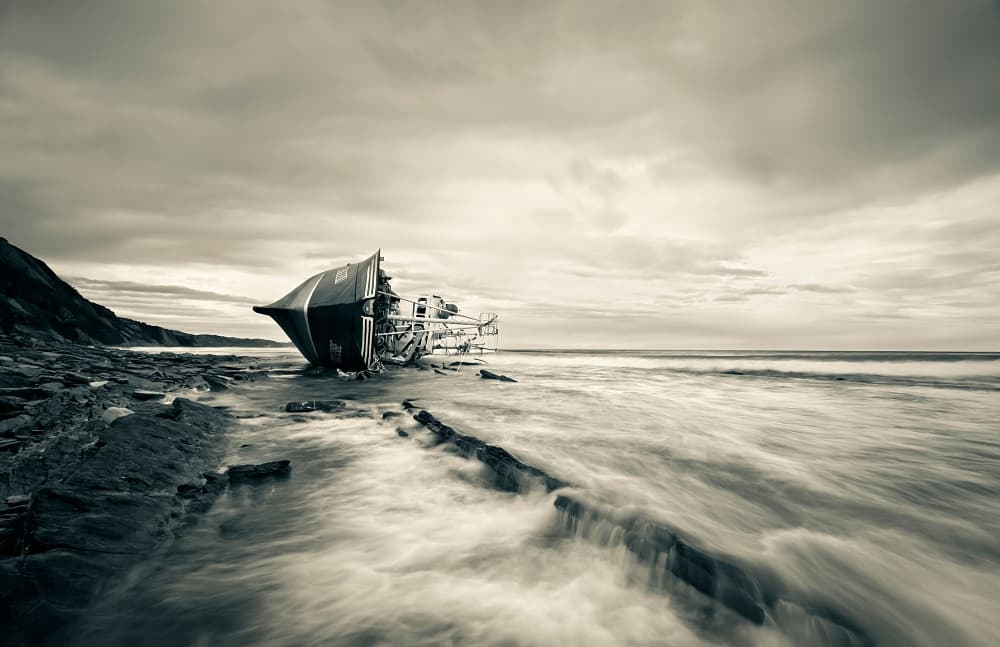 Beached Shipwreck Waves by Iñigo Barandiaran — canvas wall art