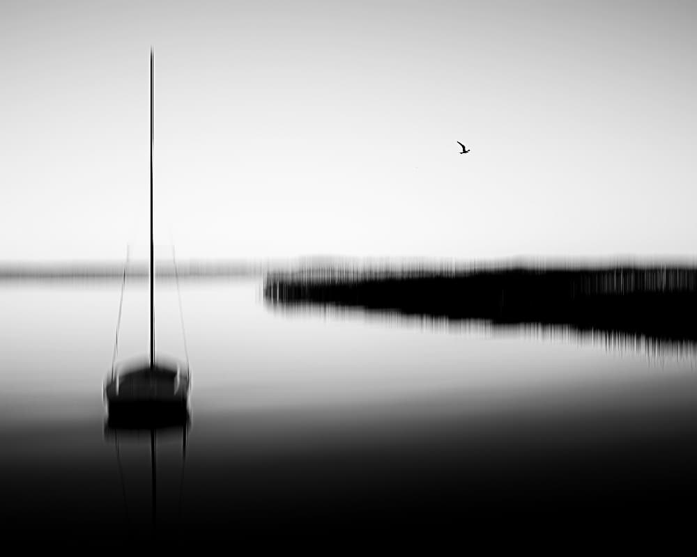 Serene Sailboat Reflection by Stefan Buder — canvas wall art
