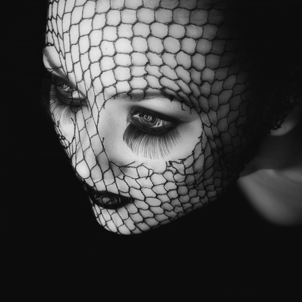 Mysterious Fishnet Face by Oren Hayman — canvas wall art