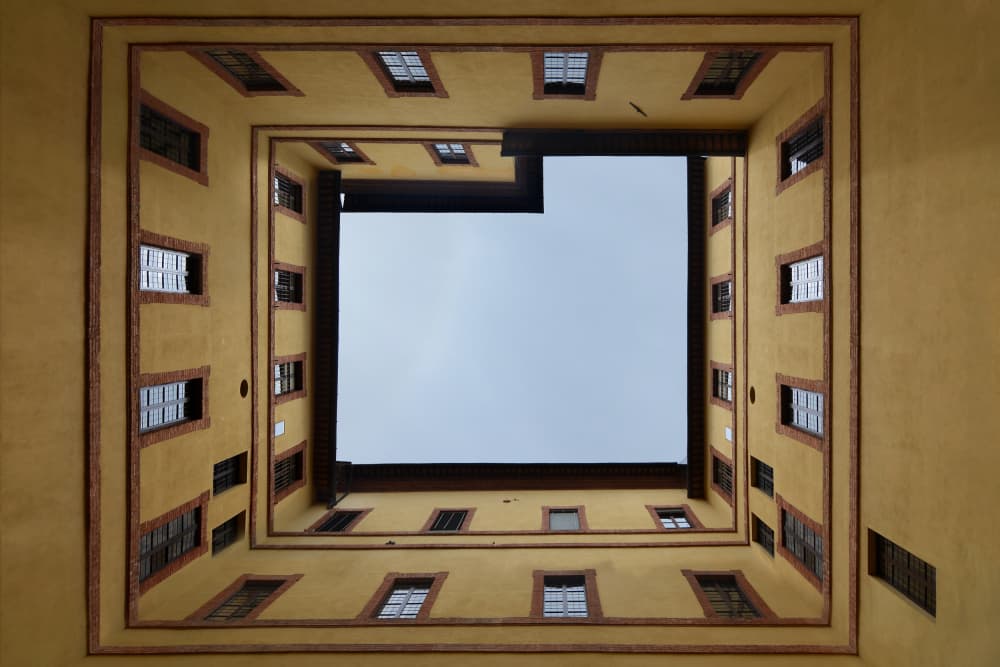 Geometric Courtyard Sky by Felix Tchvertkin — canvas wall art