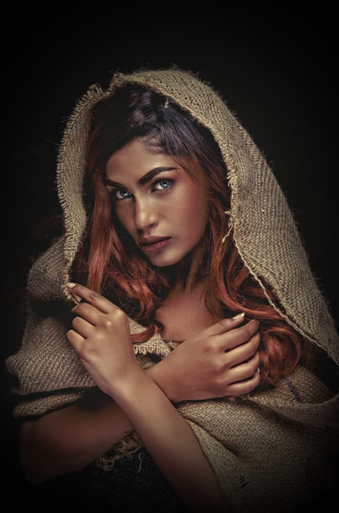 Soulful Hooded Woman by PARTHA BHATTACHARYYA — canvas wall art