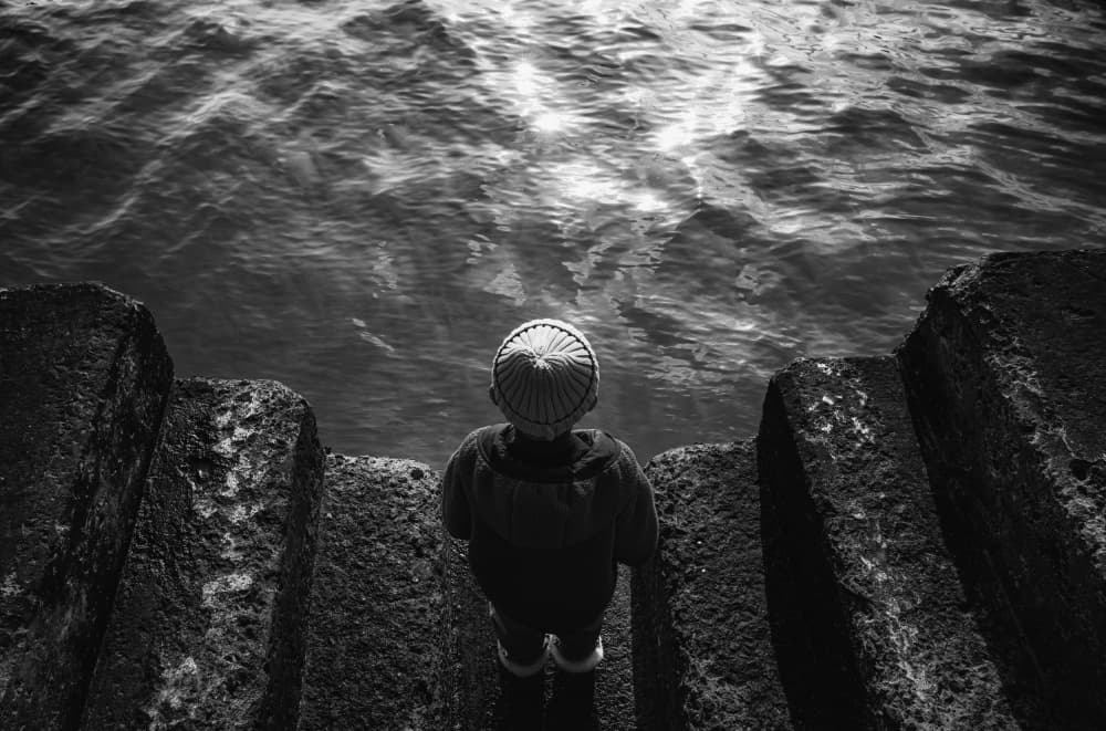 Calm Child By Water by Bong Goo Kang — canvas wall art