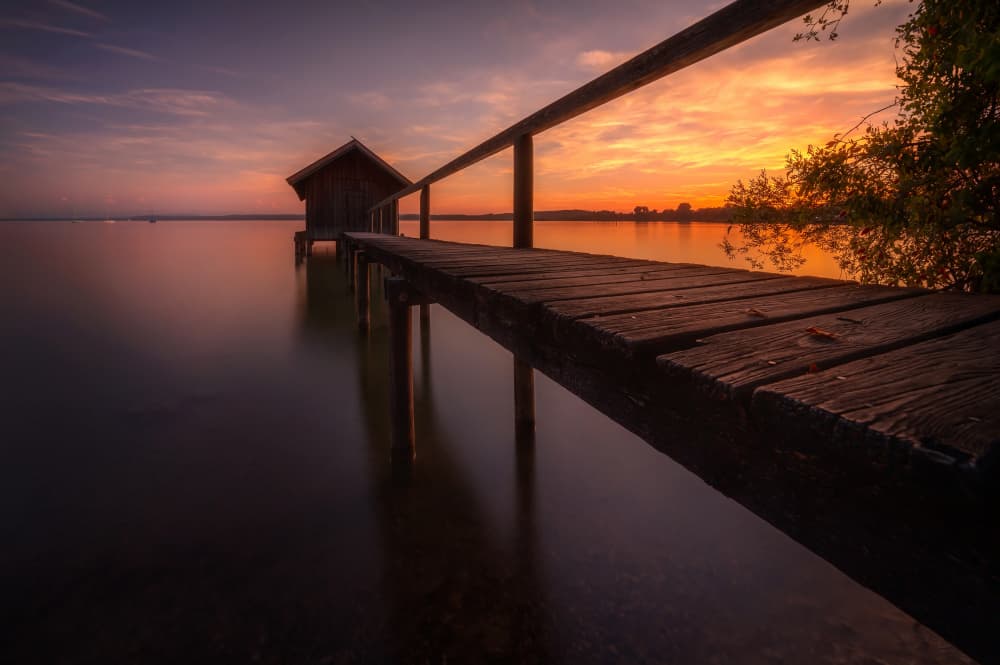Lakeside Boathouse Sunset by Anastasios Gialopoulos — canvas wall art