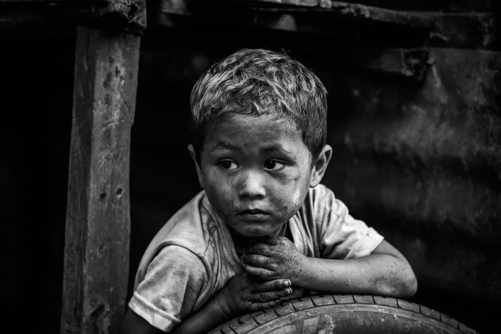 Pensive Young Boy by ADIREK M — canvas wall art