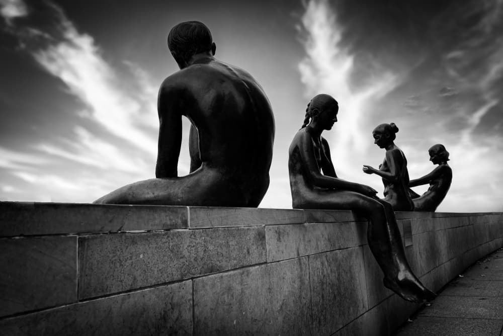 Seated Figures Dramatic Sky by Jean Vandijck — canvas wall art