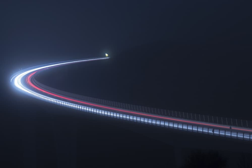 Curving Night Light Trails by Emanuela Sol — canvas wall art