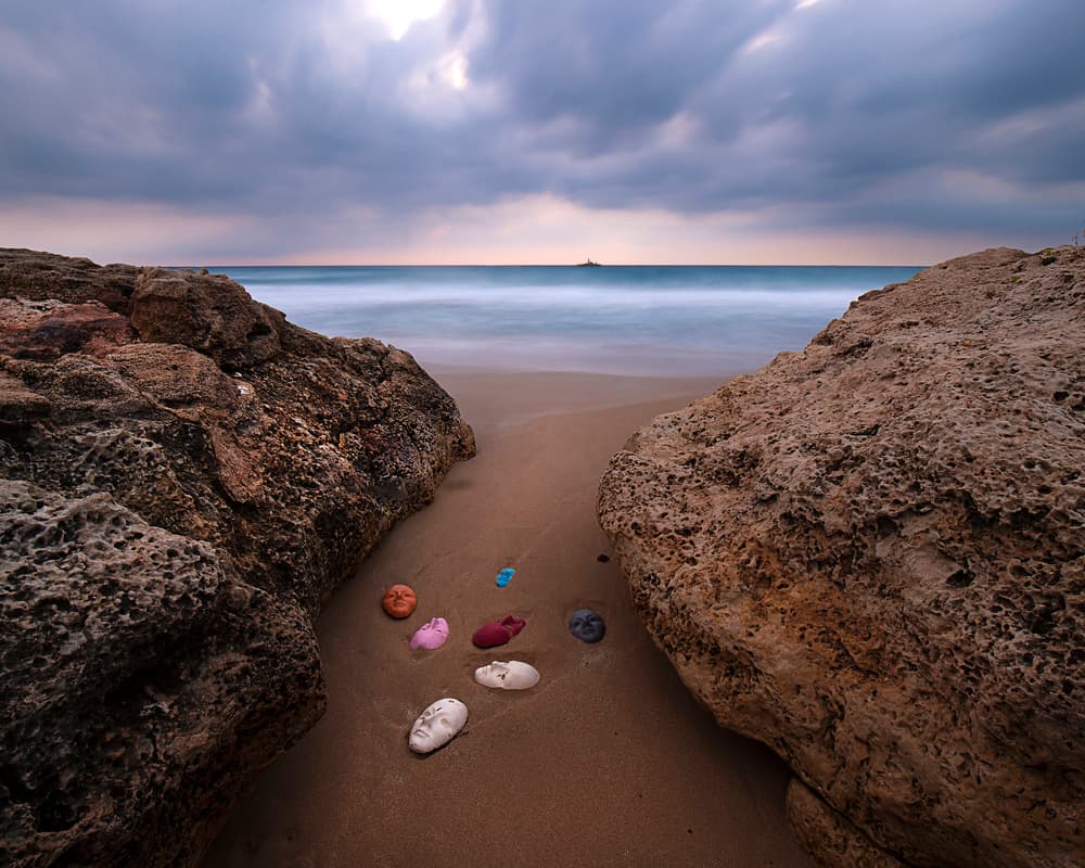 Colorful Masks Beach by Eyal Amer — canvas wall art