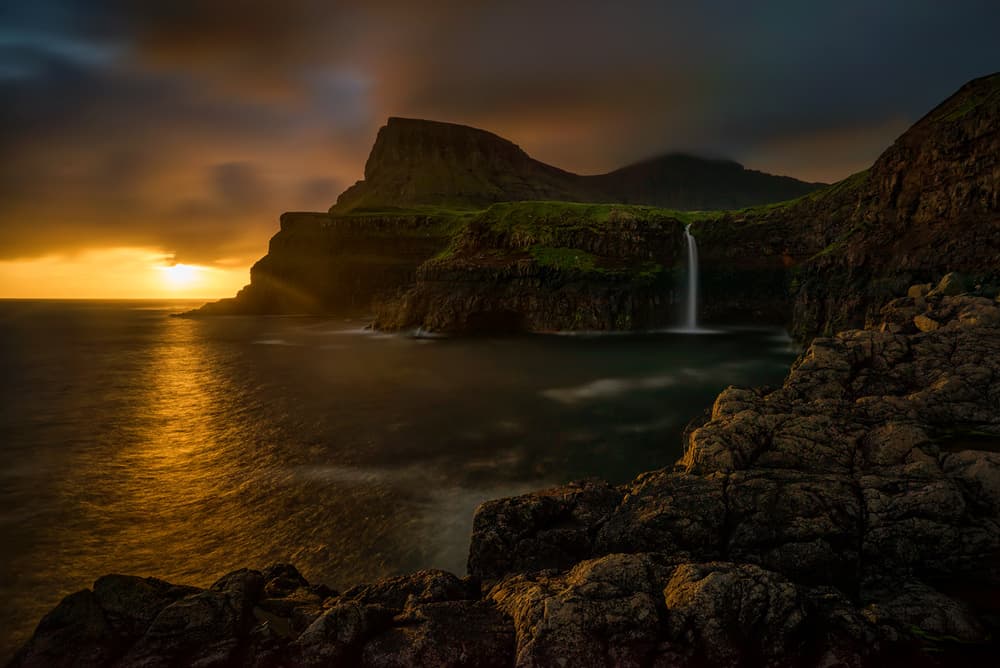 Golden Coastal Waterfall by Wojciech Kruczynski — canvas wall art