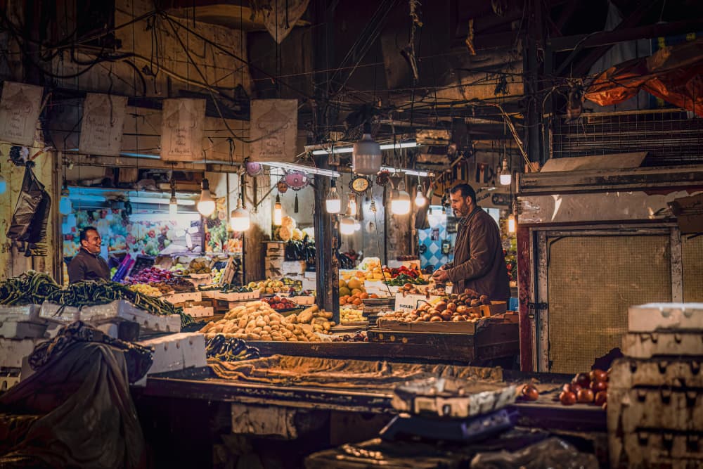Busy Market Stand by Marco Tagliarino — canvas wall art