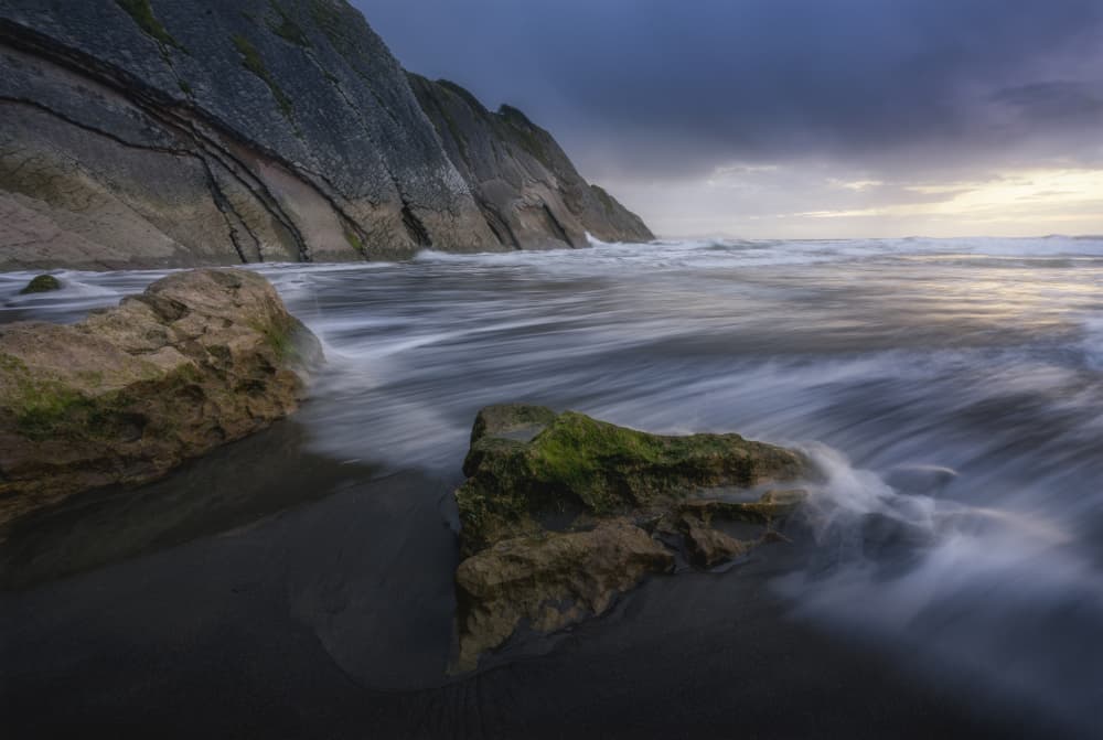 Moody Coastal Flow by Josema Martin Espinar — canvas wall art