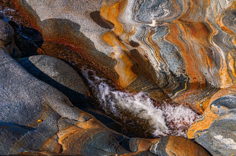 Vibrant Rock Stream by Andrew Beavis — canvas wall art