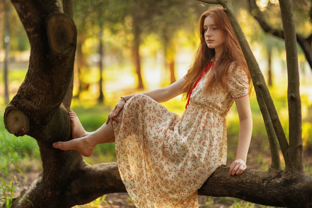 Redhead Girl on Branch by Tali Stein — canvas wall art