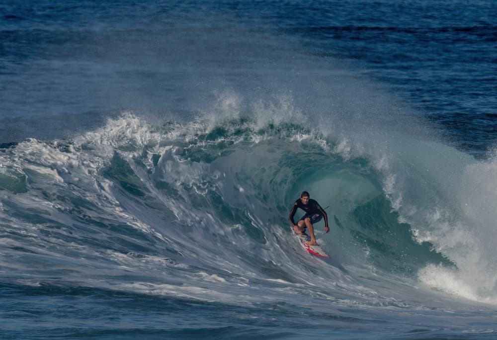 Surfer Rides A Powerful Wave by Jie Cheng — canvas wall art