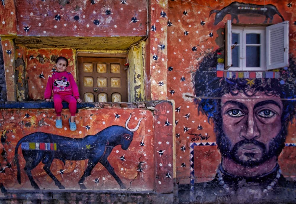 Girl and Colorful Mural by Yasmin Elsharma — canvas wall art