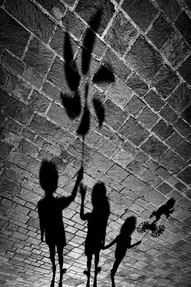 Kids Playing Shadows by Antonio Grambone — canvas wall art