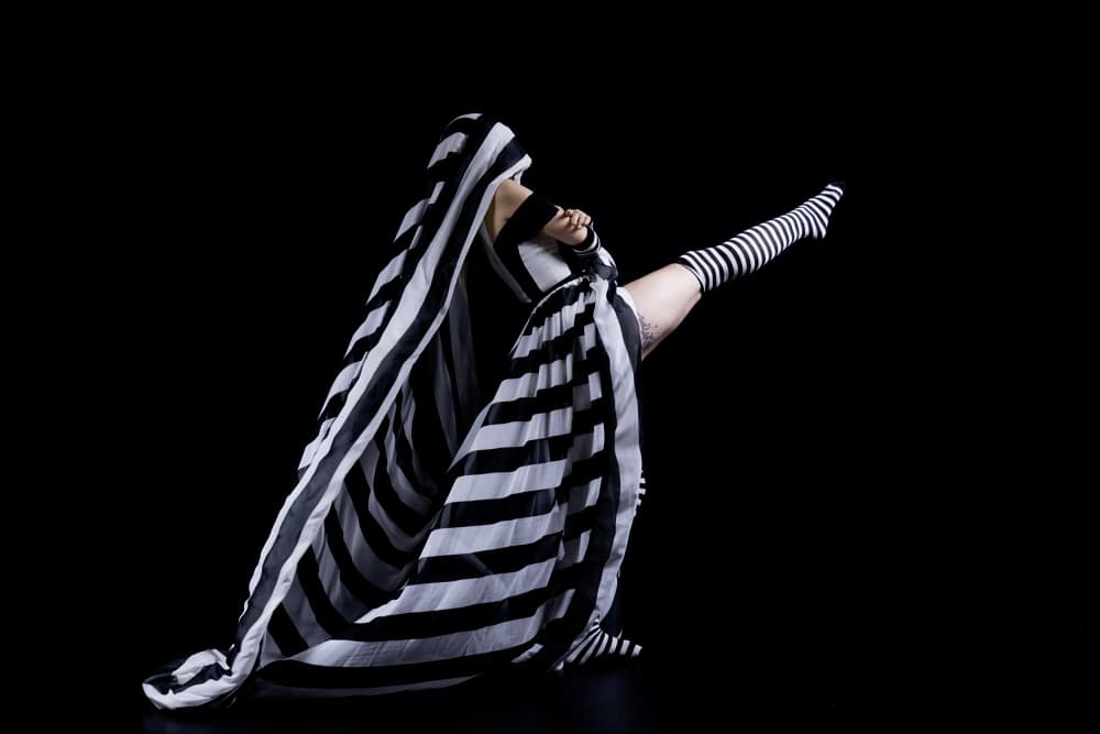 Striped Performer Pose by Gabrielle Halperin — canvas wall art