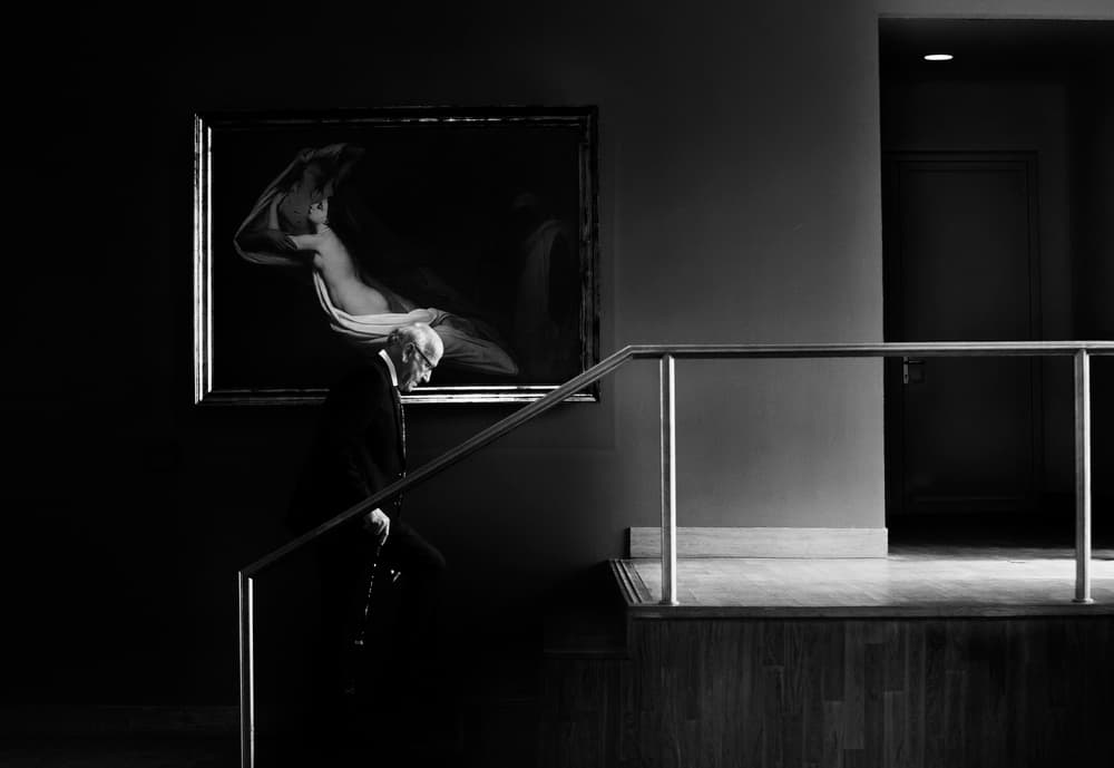 Elegant Man Gallery Scene by Julien Oncete — canvas wall art