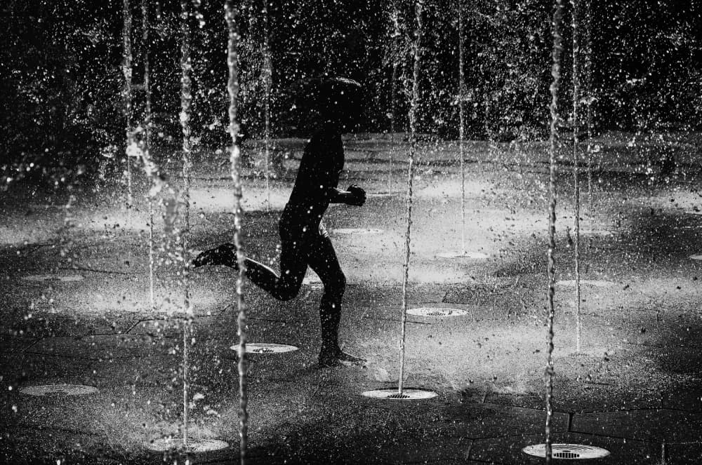 Kid Running In Fountain by Samanta Krivec — canvas wall art