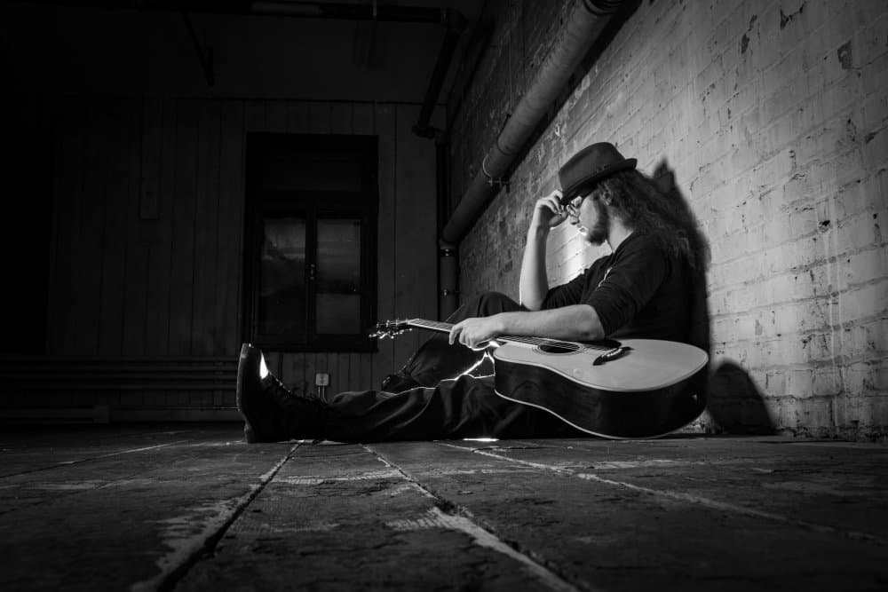 Thoughtful Guitarist by David Boutin — canvas wall art