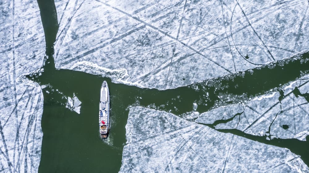 Icebreaker On Frozen River by Eser Karadag — canvas wall art