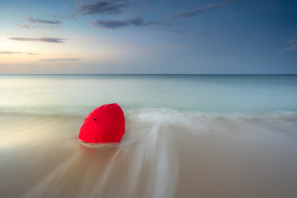 Red Umbrella Beach Waves by Rico Cavallo — canvas wall art
