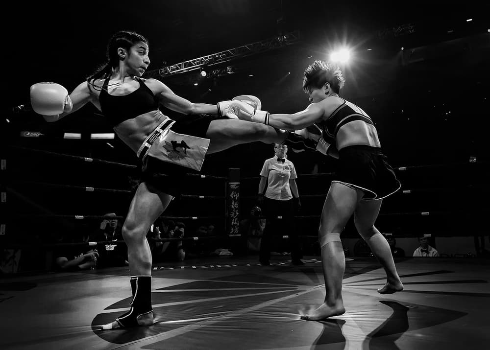 Fierce Kickboxing Action by Henry Zhao — canvas wall art