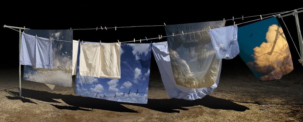 Laundry Sky Time by Chechi Peinado — canvas wall art