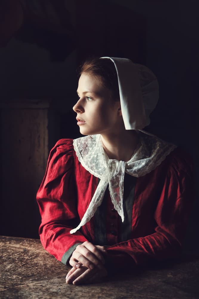 Pensive Woman In Red by Magdalena Russocka — canvas wall art