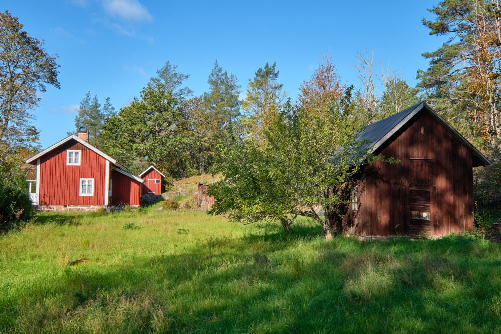 Peaceful Red Houses by Geertjan Plooijer — canvas wall art
