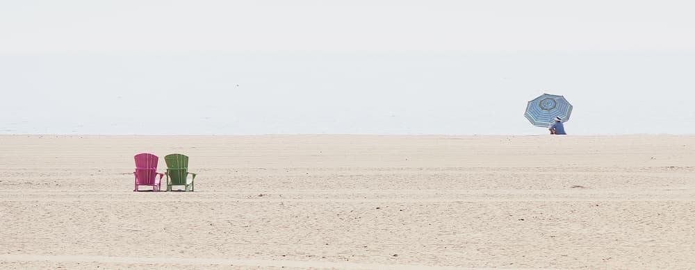 Beach Chairs and Solitude by Jian Wang — canvas wall art