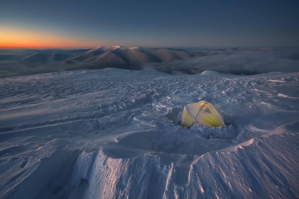 Mountain Tent Glow by Karol Nienartowicz — canvas wall art