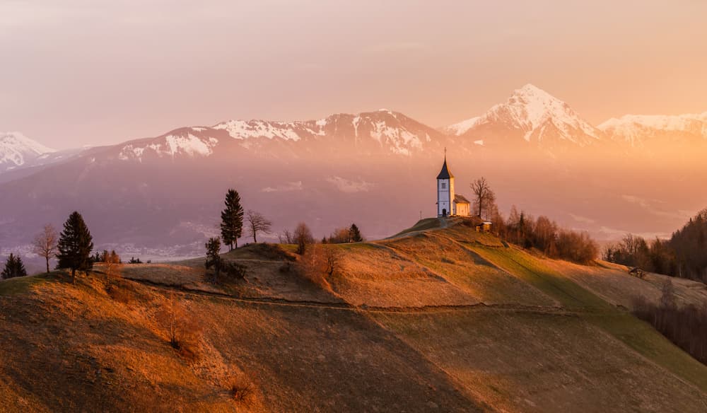 Alpine Church Golden Hour by Ales Krivec — canvas wall art