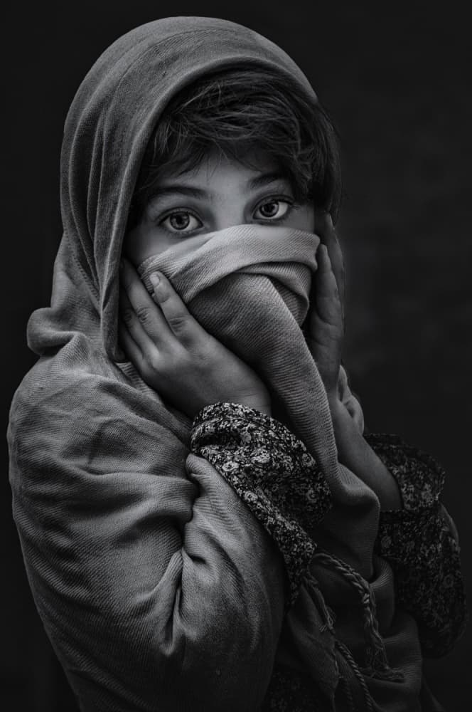Mysterious Child Gaze by Saeed Dhahi — canvas wall art
