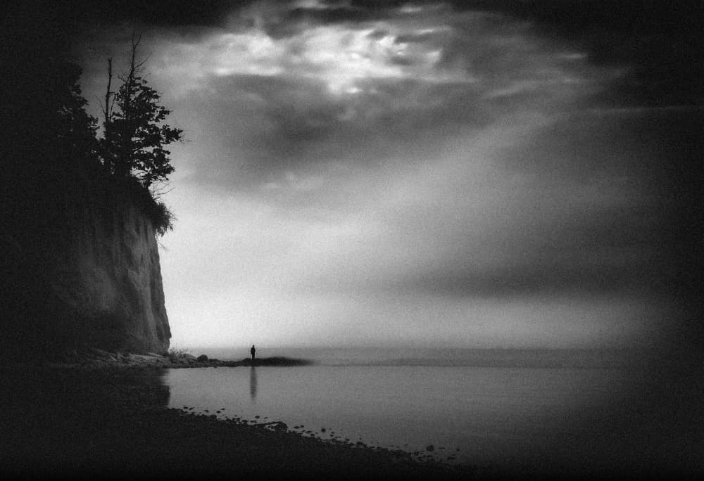 Lone Figure Misty Shore by Monika Zemojtel — canvas wall art