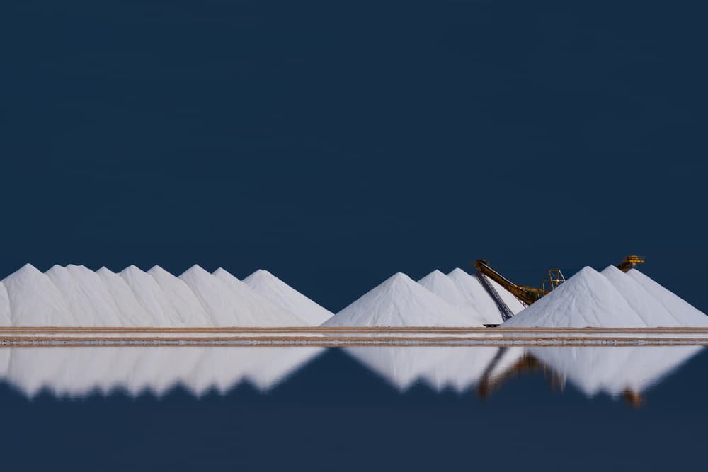 Salt Piles Reflection by Rolf Endermann — canvas wall art