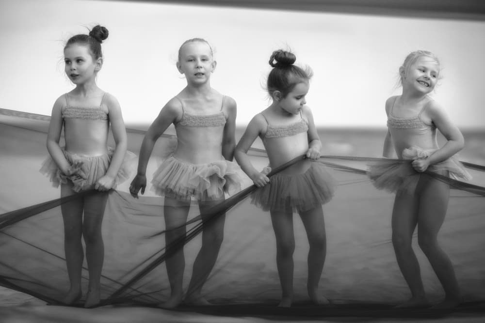 Young Ballerinas Play by Normunds Kaprano — canvas wall art