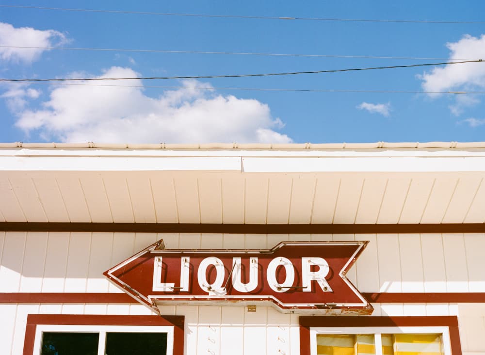 Vintage Liquor Sign by Bethany Young — canvas wall art