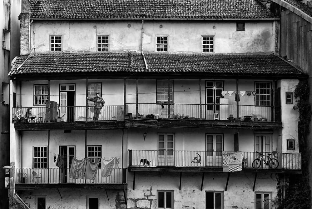 Urban Balcony Scene by Jose C. Lobato — canvas wall art