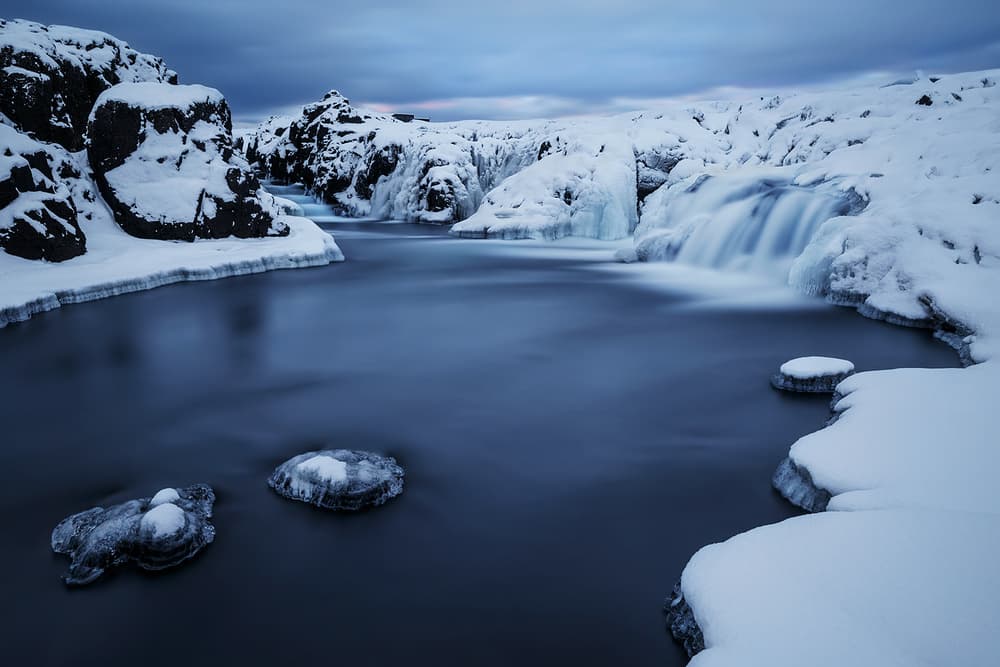 Serene Winter Waterfall by Bragi Ingibergsson - BRIN — canvas wall art