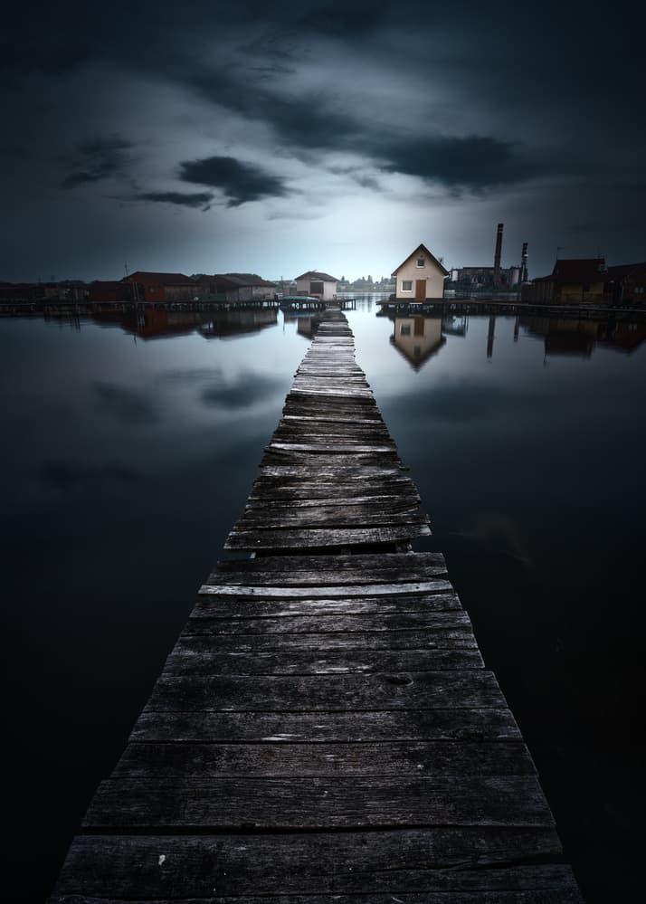 Dark Water Village Pier by Juan Pablo de Miguel — canvas wall art