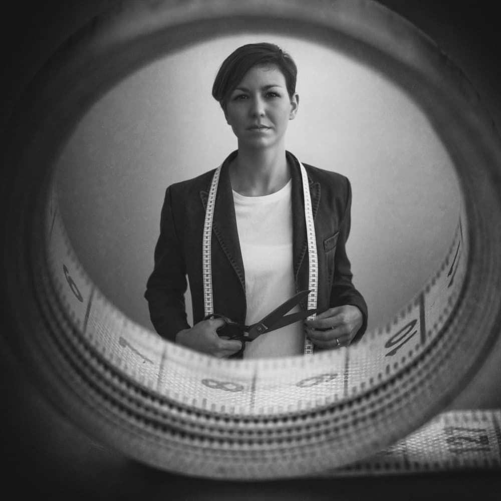Focused Tailor Portrait by Roswitha Schleicher-Schwarz — canvas wall art