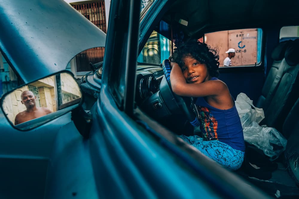 Child In Vintage Car by Nasser Al-Nasser — canvas wall art