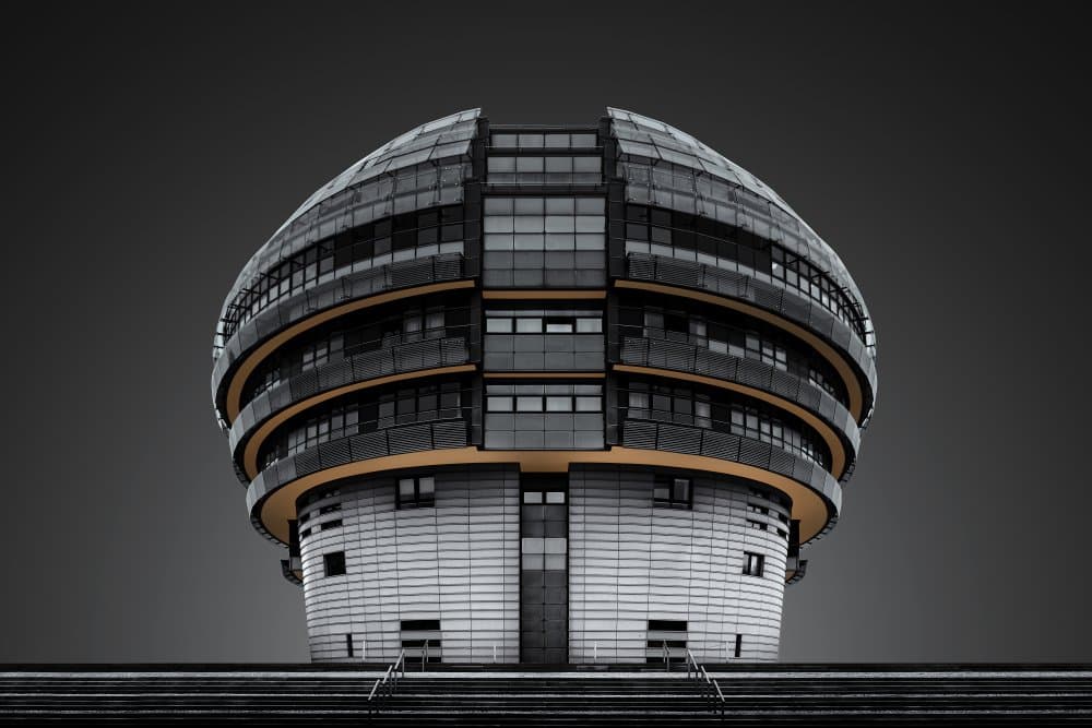 Sleek Round Building by Rolf Endermann — canvas wall art