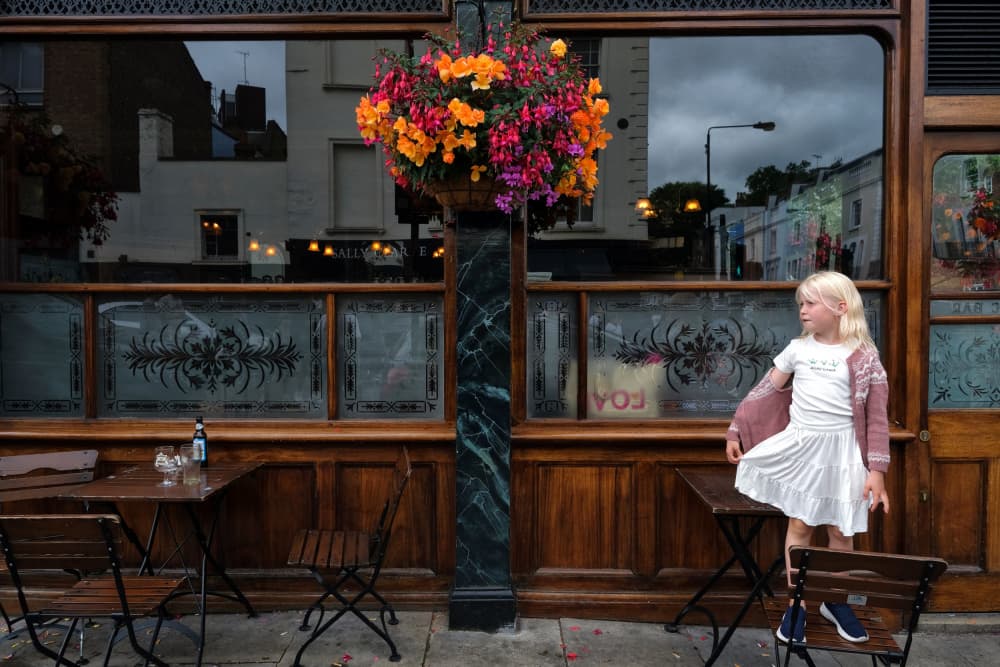 Little Girl Cafe Street by Josefina Melo — canvas wall art