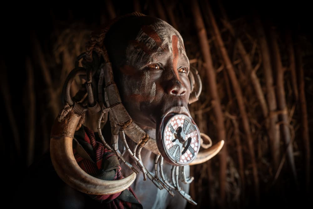 Mursi Woman Portrait by HuongHoang — canvas wall art